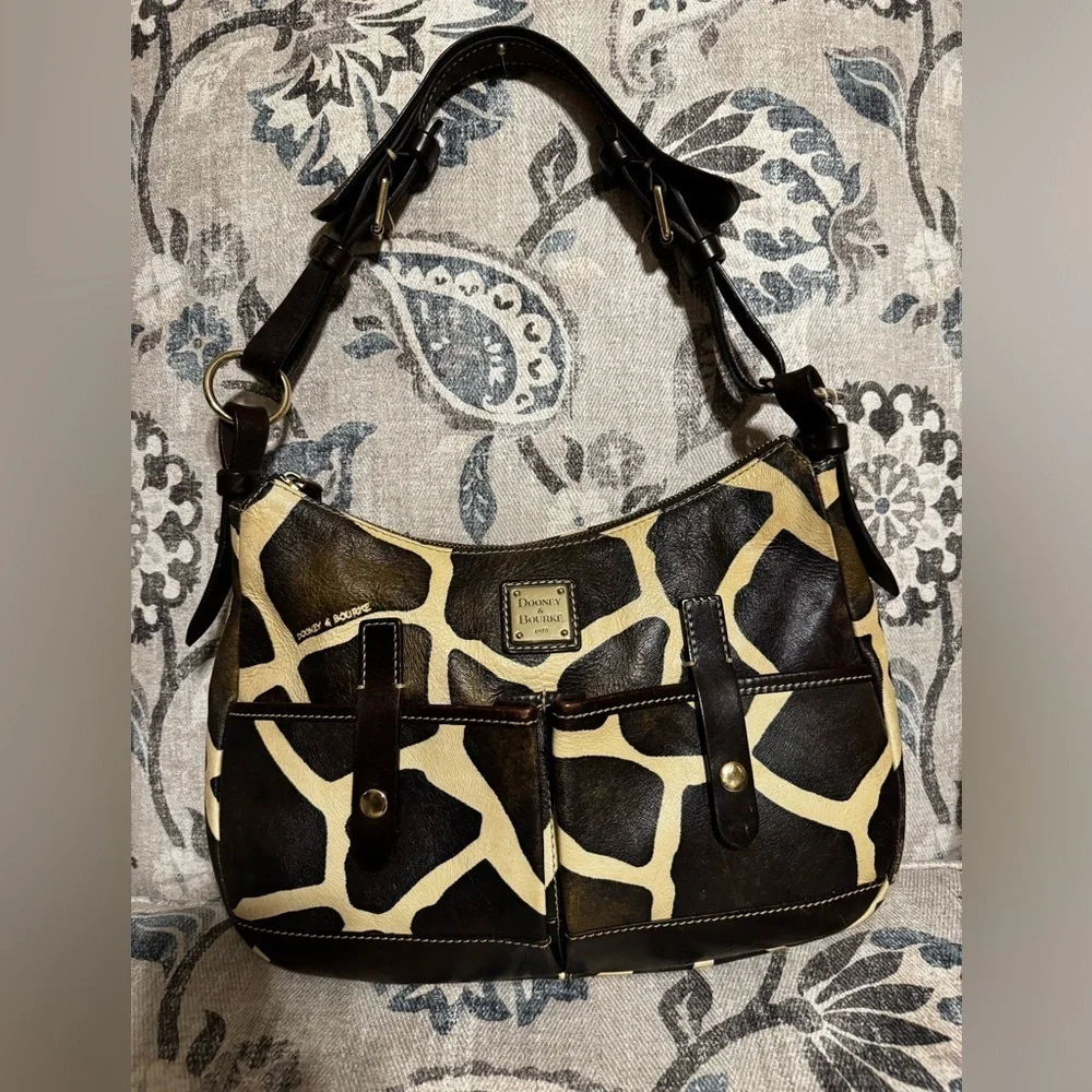 *SPRING CLEANOUT* Dooney and Bourke shoulder bag in a giraffe print style. - Picture 1 of 4